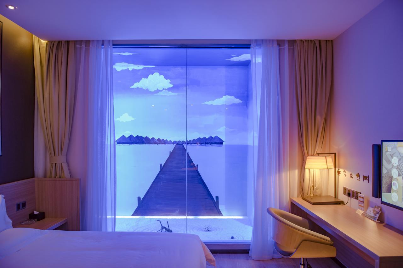 Iu Hotel Zhanjiang Haibin Avenue Xinhaimingchen Esterno foto