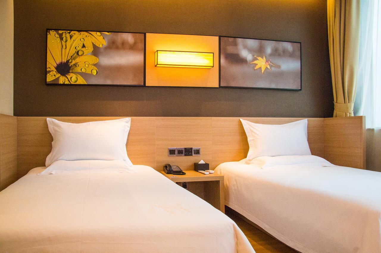 Iu Hotel Zhanjiang Haibin Avenue Xinhaimingchen Esterno foto