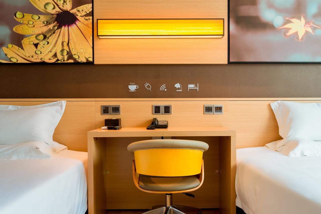 Iu Hotel Zhanjiang Haibin Avenue Xinhaimingchen Esterno foto